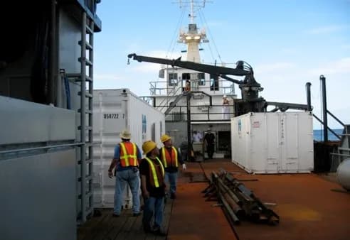Crew on the deck of a vessel